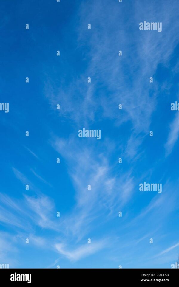 Blue sky with thin cirrus clouds scattered across it.