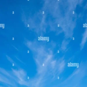 Blue sky with thin cirrus clouds scattered across it.
