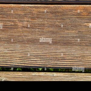 Close-up of weathered wooden planks with visible grain and natural texture.